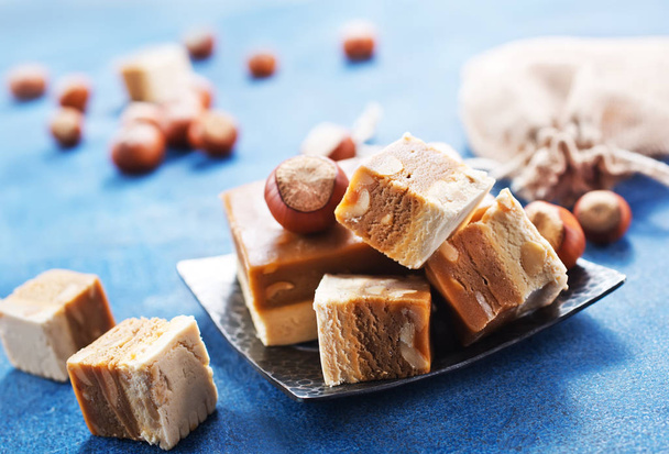 sweet nougat with nuts - 写真・画像