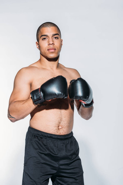 muscular african american sportsman with boxing gloves isolated on white - Φωτογραφία, εικόνα
