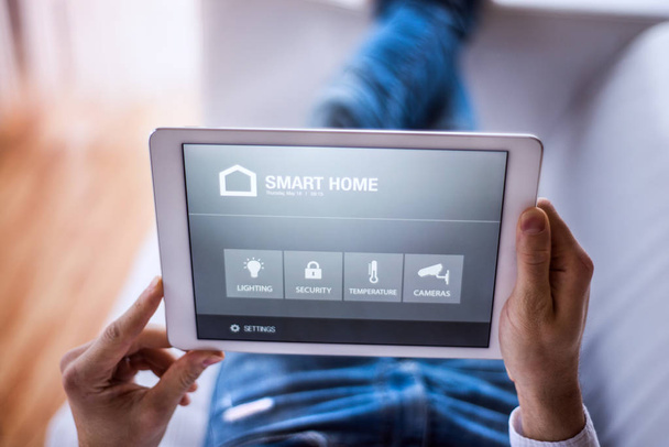 A tablet with smart home screen. - Fotó, kép