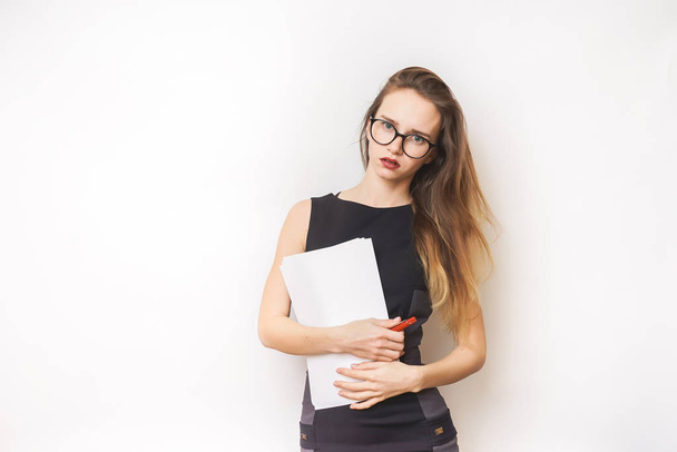 Confident young woman in glasses isolated on a white background - Φωτογραφία, εικόνα