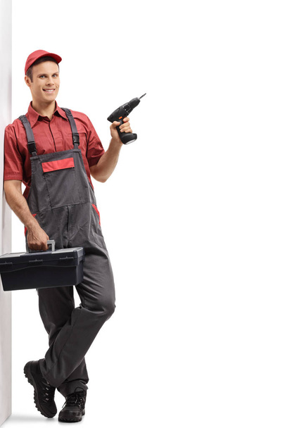 Repairman with a toolbox and a drill machine  - Photo, image