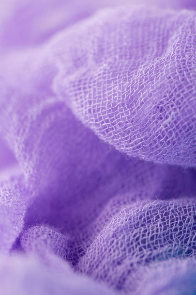 Closeup of hand dyed gauze fabric purple color. Ultra violet tre - Fotoğraf, Görsel