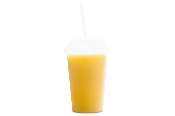 Orange juice in a plastic cup - Foto, immagini
