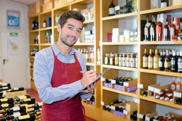 wine shop owner and sommelier - Foto, Bild