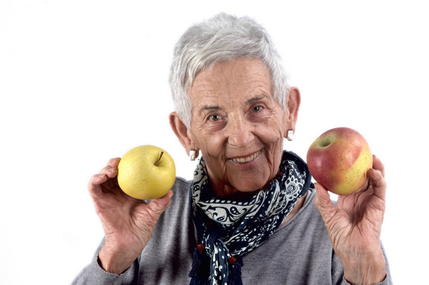 vezető nő étkezési alma, fehér - Fotó, kép