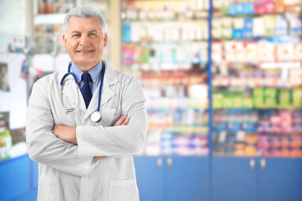 Owner of business in his pharmacy - Photo, image