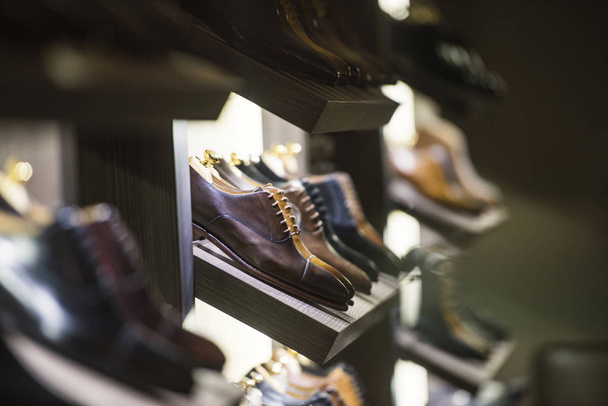Men shoes in a luxury store in Paris. - Foto, afbeelding