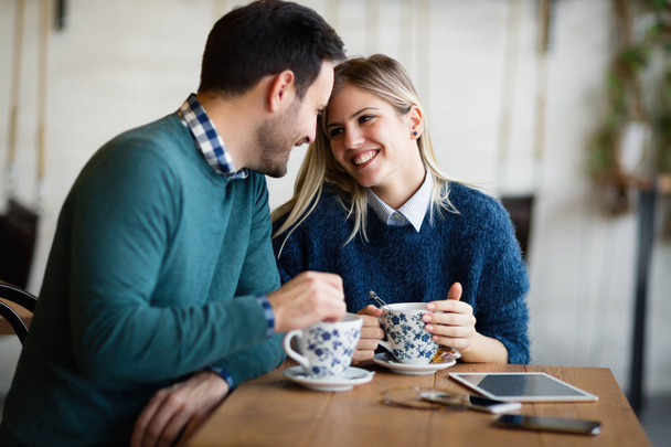 couple having date in coffee shop - Фото, изображение