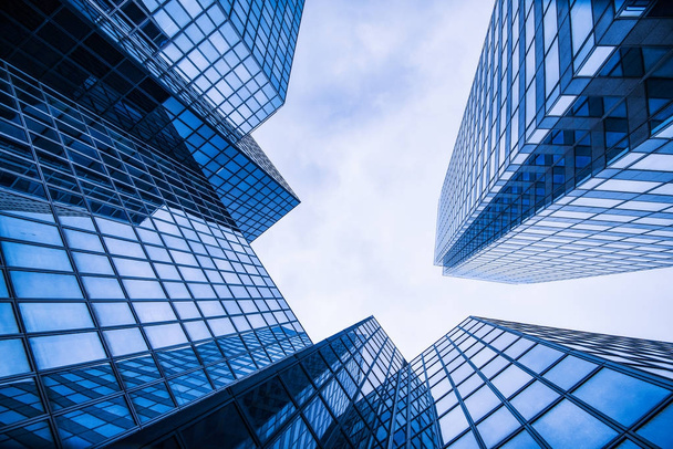 Corporate business glass building and blue sky - Fotoğraf, Görsel