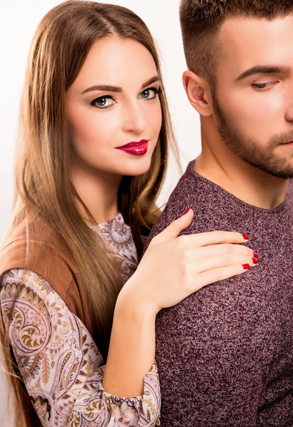 Studio portrait of young beautiful couple in love - Photo, Image
