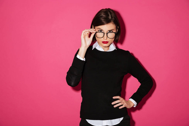 Portrait of a young serious businesswoman in eyeglasses - Fotoğraf, Görsel