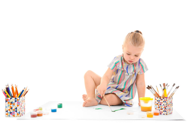 Little girl painting against white background - Photo, image