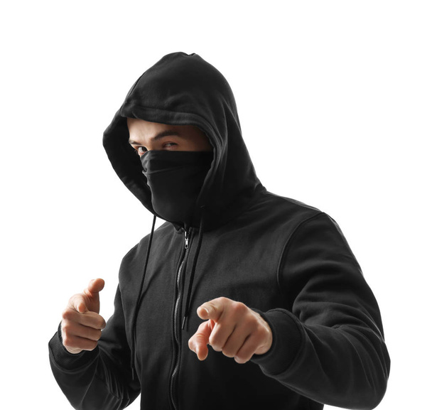Hacker in mask white background - Foto, imagen