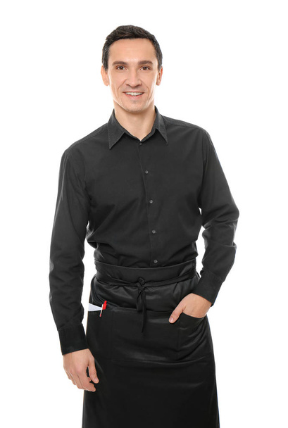 Waiter in black uniform on white background - Foto, imagen