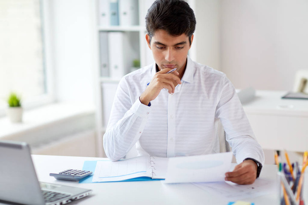 businessman working with papers at office - Foto, Imagem