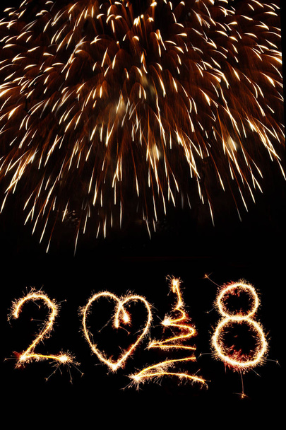2018 written with fireworks as a background - Photo, Image