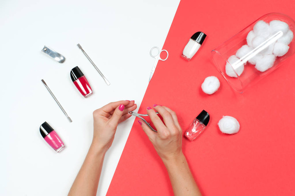 Nail salon. Beautiful female hands with pink manicure.  - Φωτογραφία, εικόνα