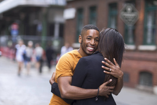 couple hugging in the street - Photo, Image