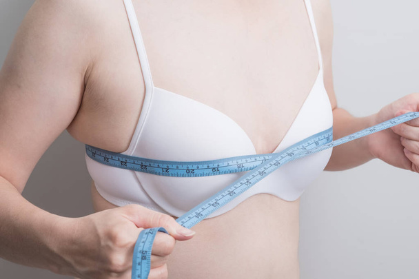 Fat overweight woman with  measurement tape - Foto, imagen