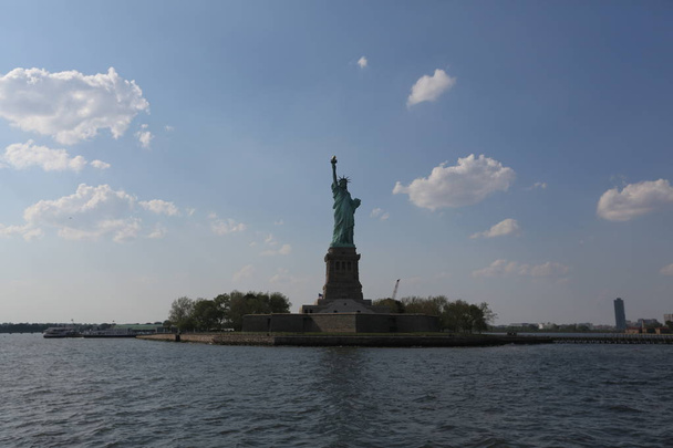 Statue of Liberty and cloudy sky. America, New York City - May 13, 2017 - Φωτογραφία, εικόνα