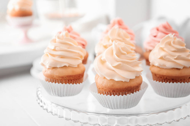 Tasty cupcakes on stand - Photo, Image