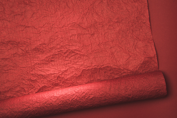 close up view of red wrapping paper texture - Foto, Imagen