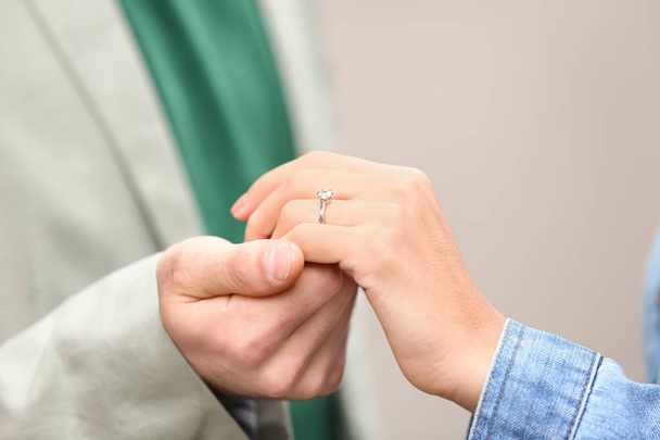 Man holding fiancee's hand - Φωτογραφία, εικόνα