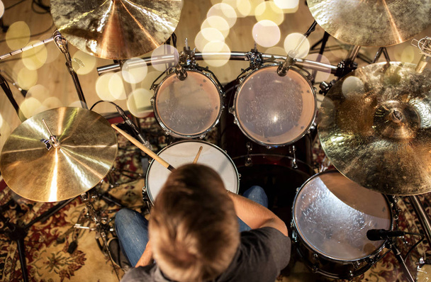 musician or drummer playing drum kit at studio - Фото, зображення