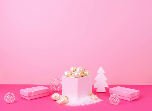 Christmas tree balls on a pink background - Fotó, kép