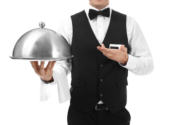 Waiter with metal tray and cloche on white background - Foto, Imagen