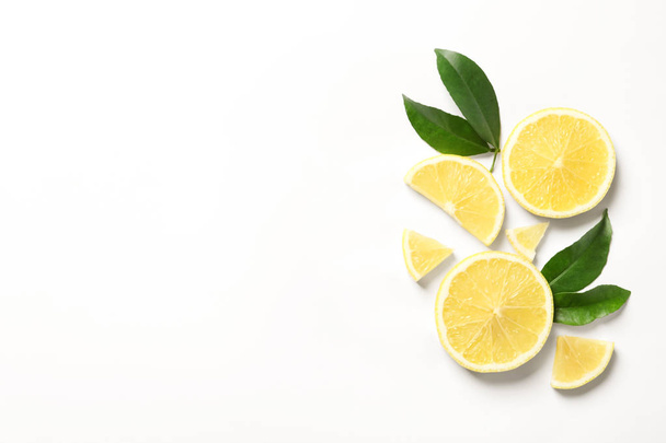 Composition with ripe lemons on white background - Foto, Imagem