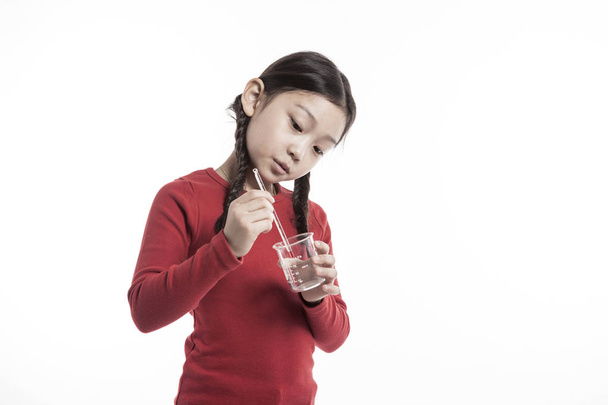 cute Girl making chemical experiments. - Photo, Image