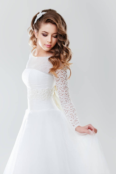 fashion portrait of young beautiful woman in white wedding dress  - Fotografie, Obrázek