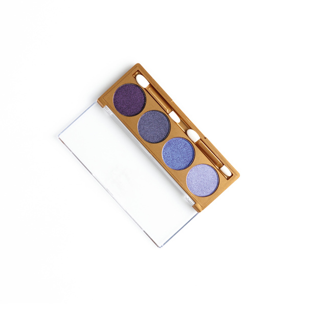 top view of opened container with different shaded purple cosmetic eye shadows isolated on white - Photo, Image