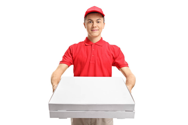 pizza delivery boy giving pizza boxes - Valokuva, kuva