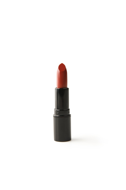 één buis van rode lippenstift op wit wordt geïsoleerd - Foto, afbeelding
