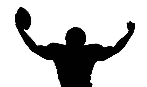 american football player celebrating after scoring a touchdown - Фото, зображення
