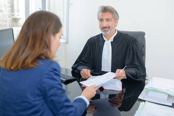 Solicitor with client and solicitor - Foto, Imagen