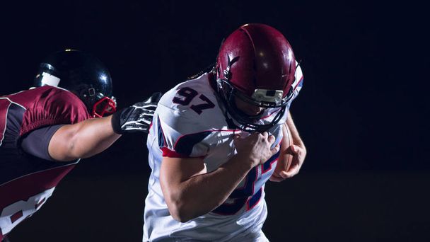 American football players in action - Foto, afbeelding