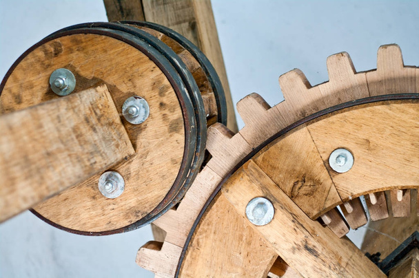 historical gears in wood and metal with wheels and teeth - Photo, Image