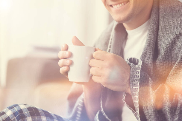 Lovely guy having a cup of coffee - Zdjęcie, obraz