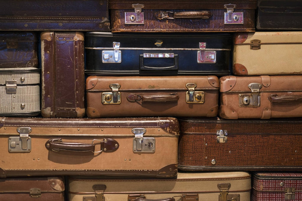Old Suitcases Stacked  On Top Of Each Other - Фото, изображение