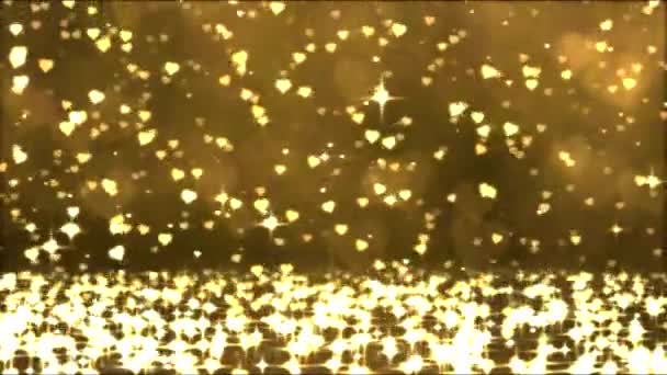 Színes csillogó szív alakú zuhan - hurok arany - Felvétel, videó