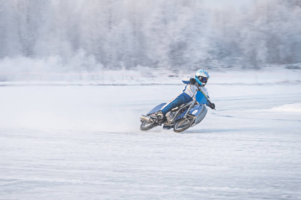 Winter Speedway. Racers unmarked drive on the ice road - Photo, Image