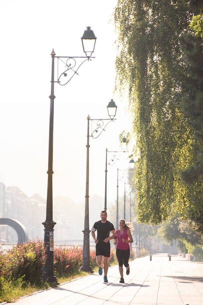 young couple jogging  in the city - Φωτογραφία, εικόνα