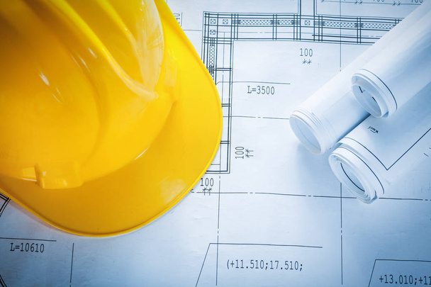 Protective building helmet construction plans on blueprint - Photo, Image