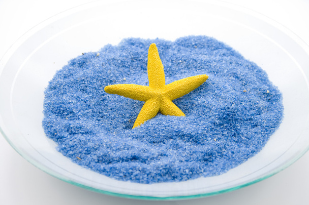 Blue little stones with sea star - 写真・画像