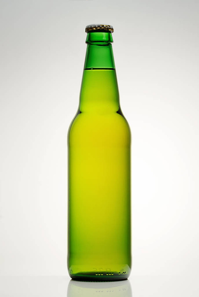 bottle of beer from green glass - Foto, afbeelding