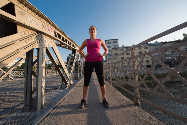 portrait of a jogging woman at sunny morning - Foto, immagini