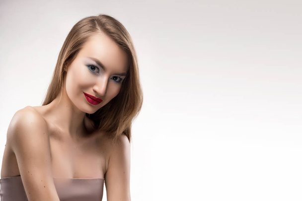 Portrait of the beautiful smiling blonde girl with red lips and  - Foto, immagini